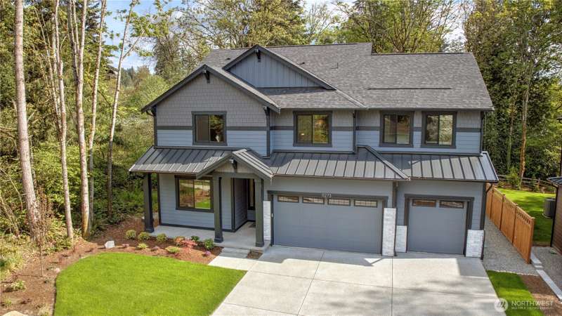This 3,579 SF home is one of two in a small enclave of custom homes surrounded by tranquil tees and beautiful sunsets.