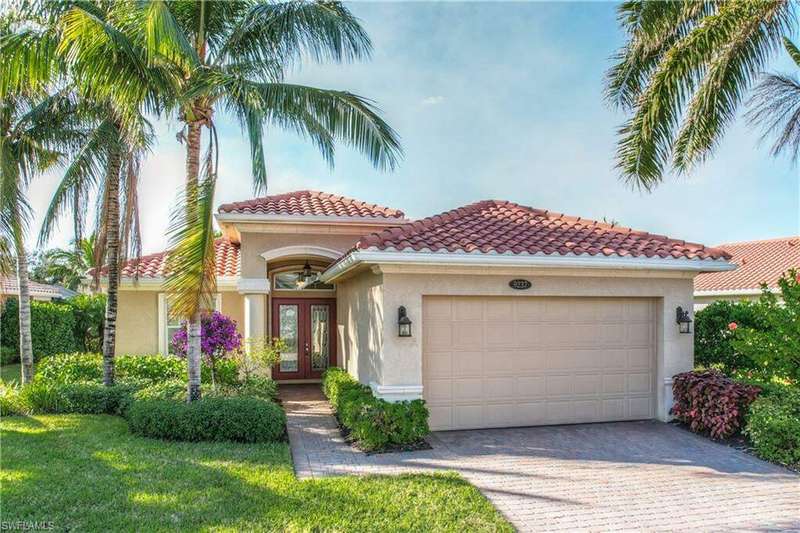 Mediterranean / spanish-style house featuring french doors and a garage