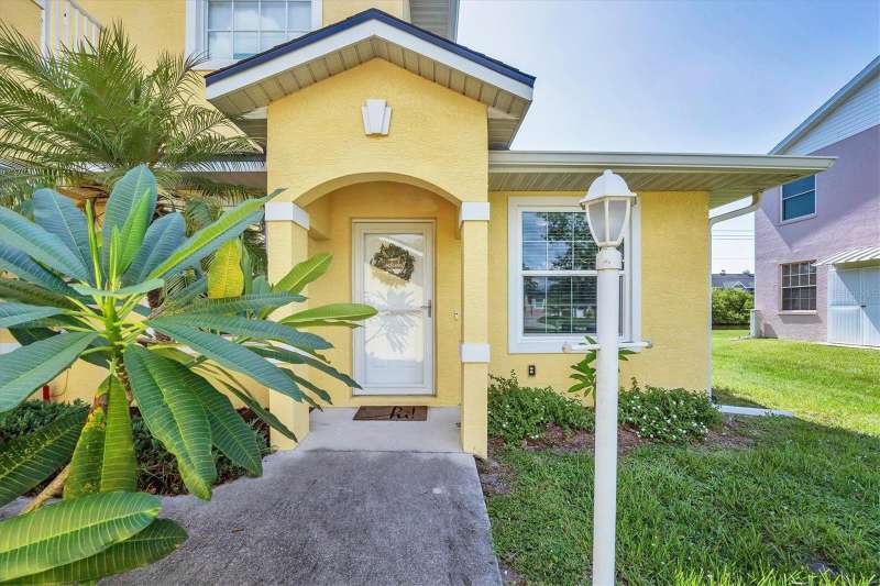 EXCEPTIONAL, REMODELED, TURN-KEY FIRST FLOOR CONDO WITH WATER VIEWS & GARAGE!