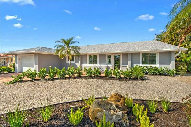 Single story home with a garage