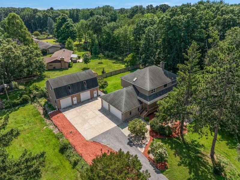 Amazing home with detached 2 story barn