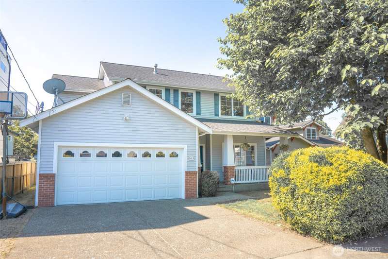 Front entry with 2 car driveway.