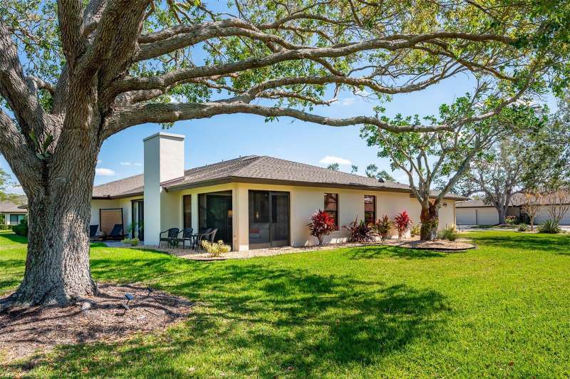 Rear view with magnificent shade tree