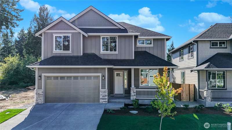 lStriking exterior with long-lasting Hardi brand durable siding, NW architectural accents and stone garage returns make this new home warm and inviting