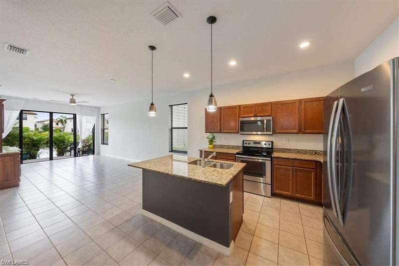 View of patio featuring a water view and a residential view