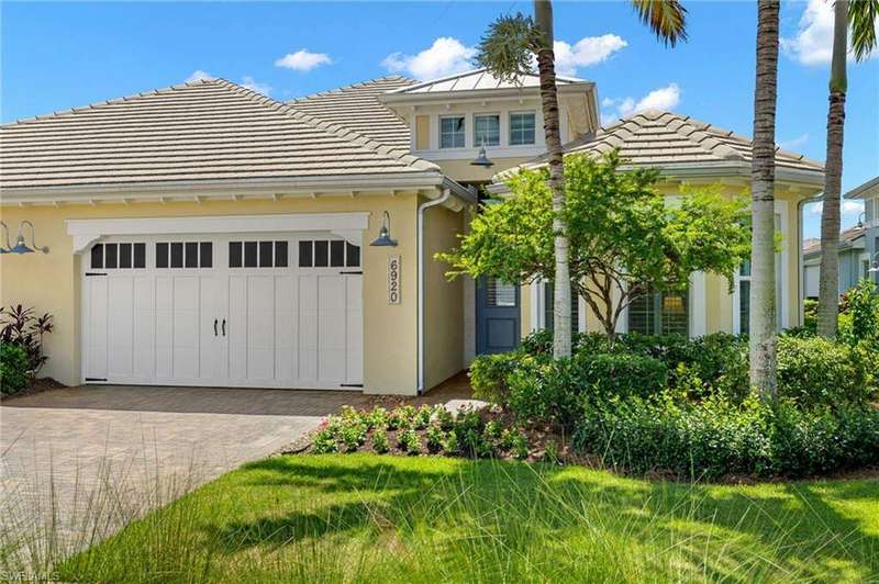 View of front of property with a garage