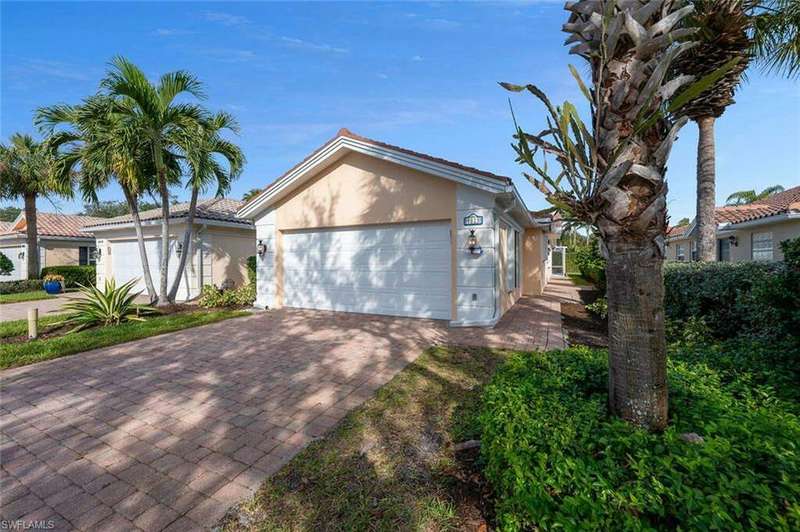 Single story home with a garage