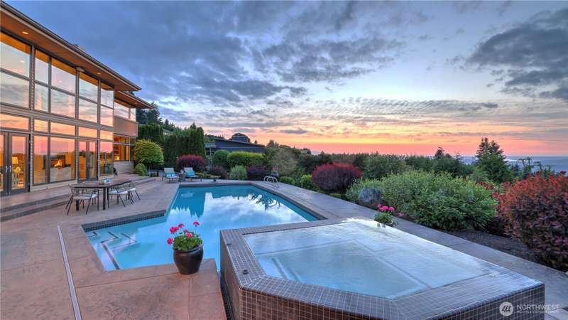 Indulge in the pinnacle of Northwest luxury living with this exquisite custom  built masterpiece, designed by renowned architect James Rudolph and   crafted by acclaimed builder Adam Leland.