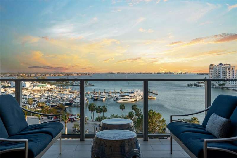 Perfectly positioned to embrace both sunrise and sunset over Sarasota Bay, Golden Gate Point, and the Keys