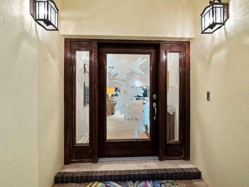 Close up of etched glass front door