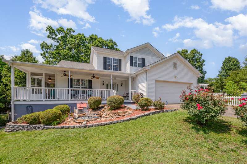 Wrap around rocking chair front porch and side screened porch