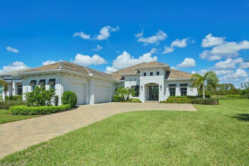 Mediterranean / spanish-style house featuring a garage and a front yard