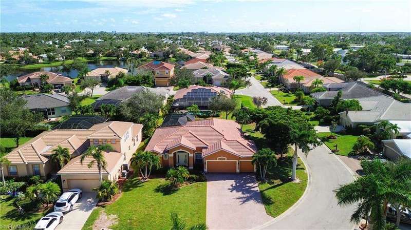 Single level home, spacious paved driveway and 3 car garage