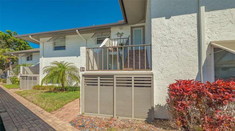 SECOND FLOOR CONDO IN DESIRABLE PELICAN HARBOUR CONDO COMPLEX