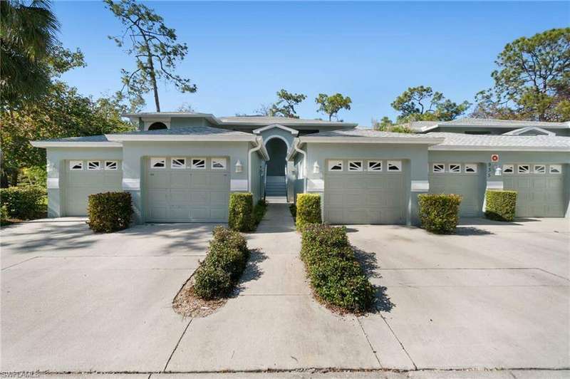 Ranch-style home with a garage