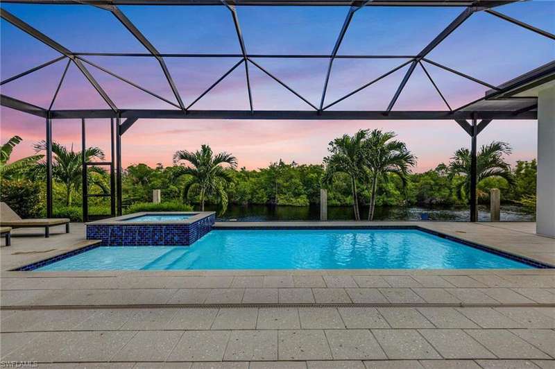 Serene views of the mangroves! No homes across the canal.  Ultimate privacy! Soak in the sun in your salt water pool & spa!
