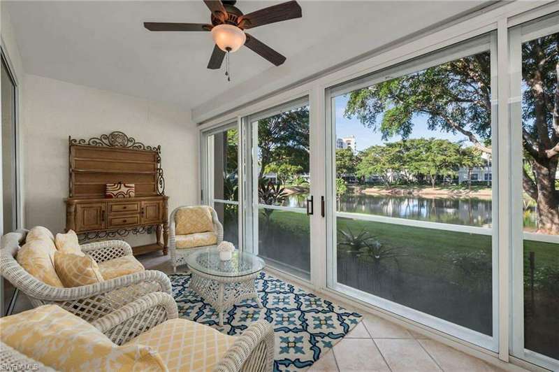 Glassed-in lanai with electric Hurricane Shutters