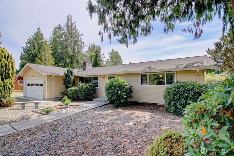 This well maintained home has great curb appeal with easy low maintenance landscaping.
