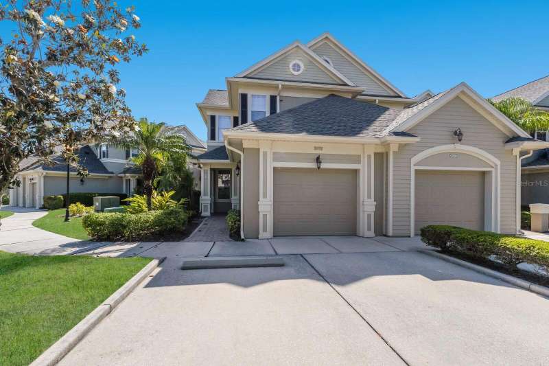 Bonus of extra wide drive with TWO designated parking spaces!