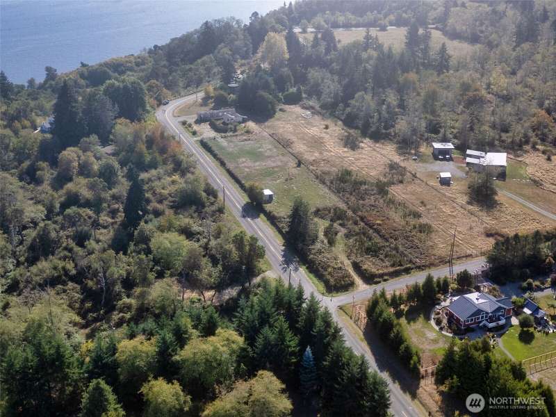 This spacious sunny flat lot borders the Maury Island Marine Park.