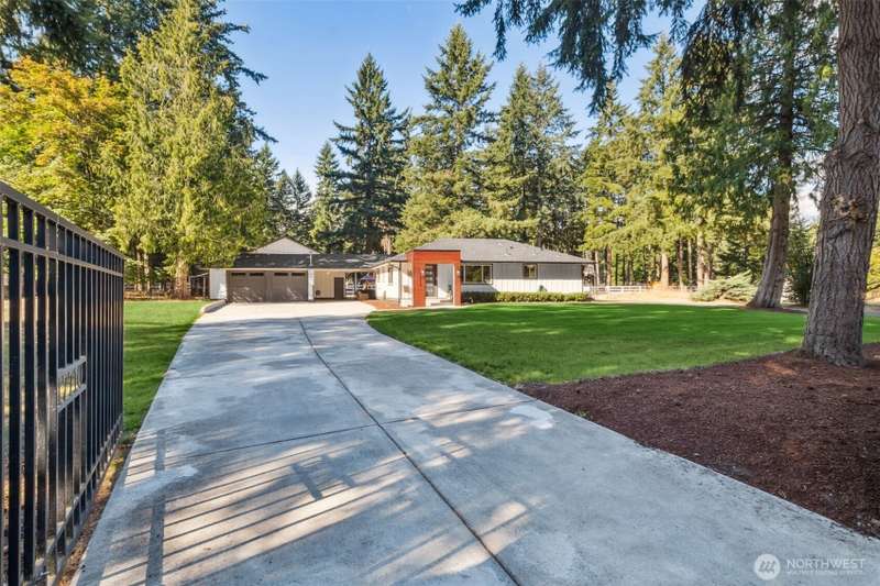 Beautifully updated with Northwest Contemporary touches on its estate-style setting of almost 2.5 acres!