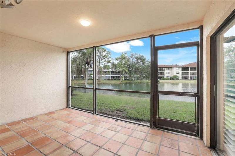 Lanai with a water view and plenty of natural light