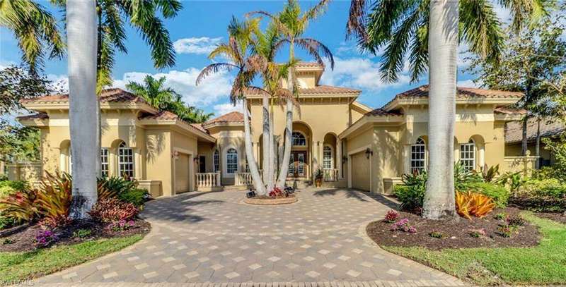 Mediterranean/Spanish-style home featuring two attached garages