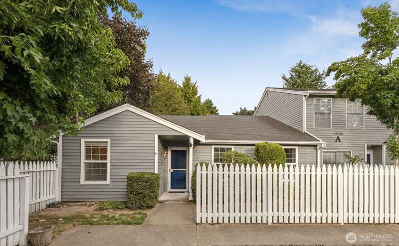 Updated single-level end-unit condo w/ exceptional privacy & peaceful garden views.