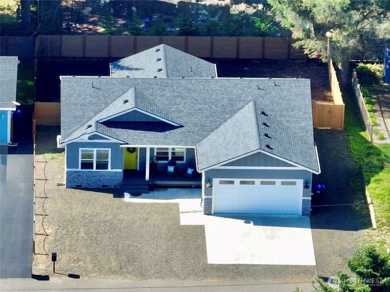 New Jewel Box Residence near beach at Ocean Shores, WA! This stunning home exudes impeccable design and upscale finish materials throughout.