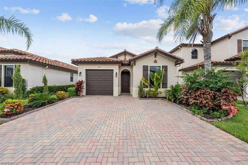 Mediterranean / spanish-style house featuring stucco siding, a garage, decorative driveway, and a tiled roof
