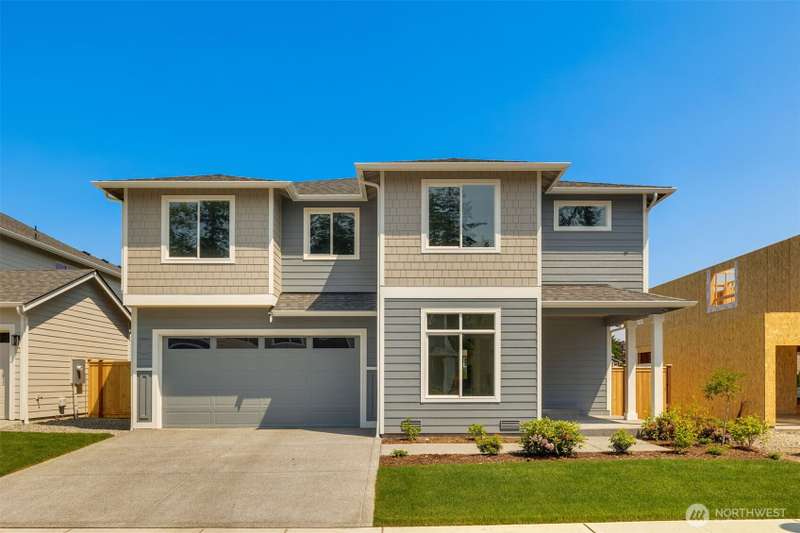 Picture of a previously completed home in the community and is for illustrational purposes only. Actual plans and specs may vary. Some features shown may be upgrades.