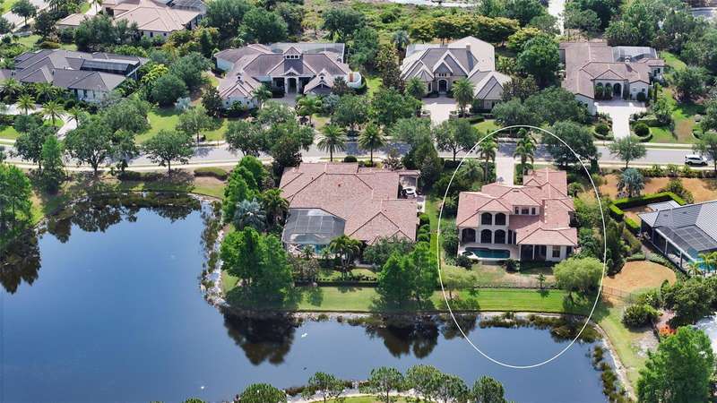 Serene, nearly half-acre lakefront lot