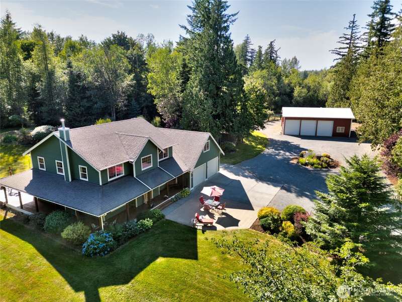Discover your ideal country escape on this parklike property that offers the perfect balance of space, comfort, and versatility. The expansive grounds feature a large shop, open lawn for games and entertaining, a dedicated garden area, and fenced zones re