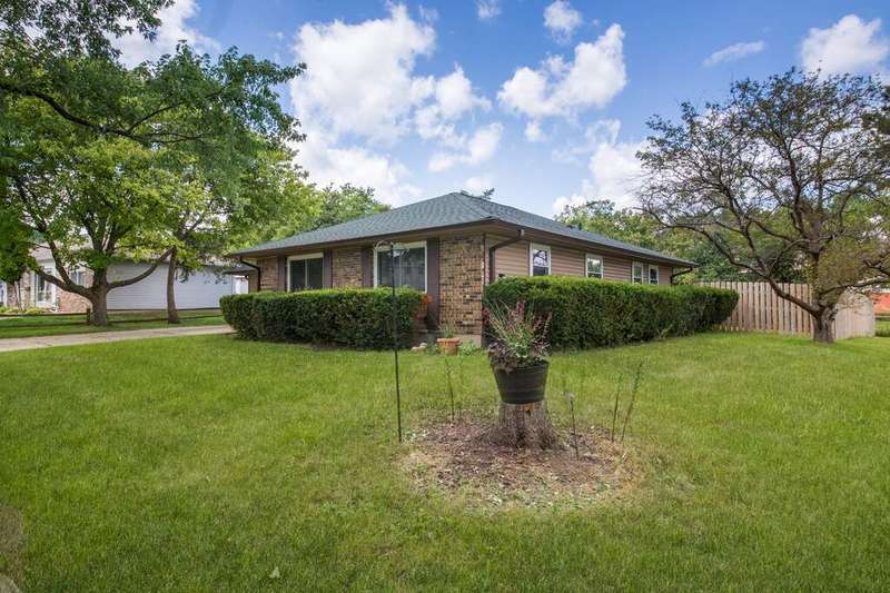 Brick ranch on corner lot with fence, new roof, ne