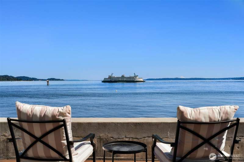 Epic year-round views from your spacious Trex deck. If the weather isn't agreeable, you can still enjoy the views from most of the rooms inside the home. Seattle skyline in the distance.