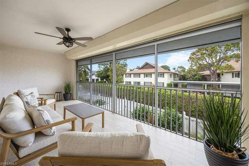 Screened-In Lanai with brand new Tile & Electric Hurricane Shutters