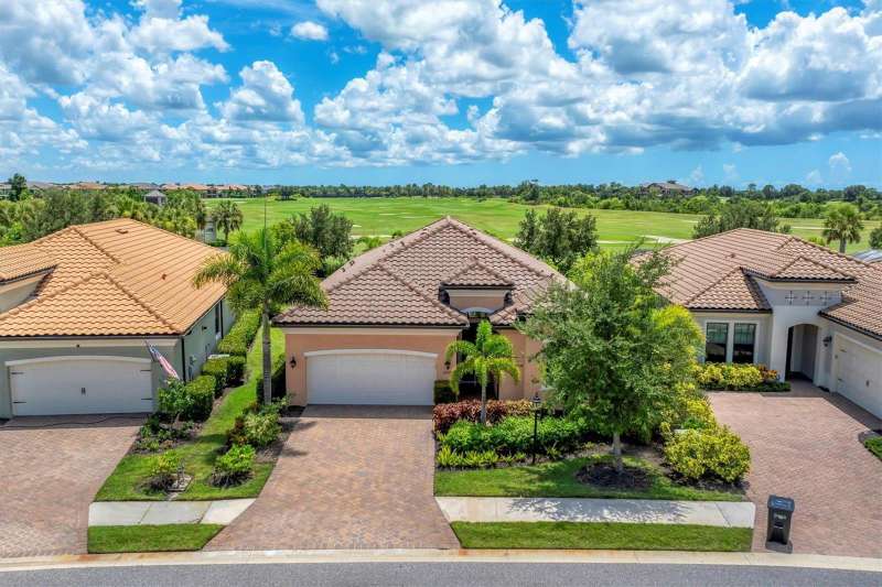 Private golf range behind, buffered with beautiful Landscaping
