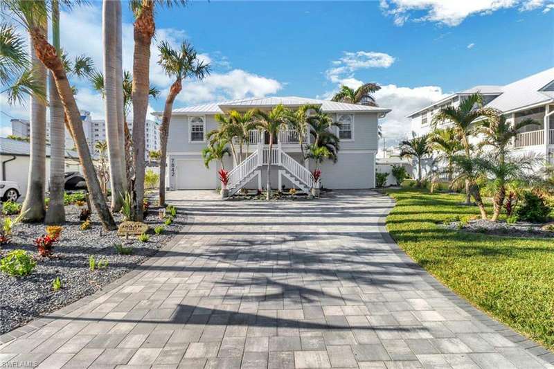 Great curb appeal,  spacious pavered driveway.