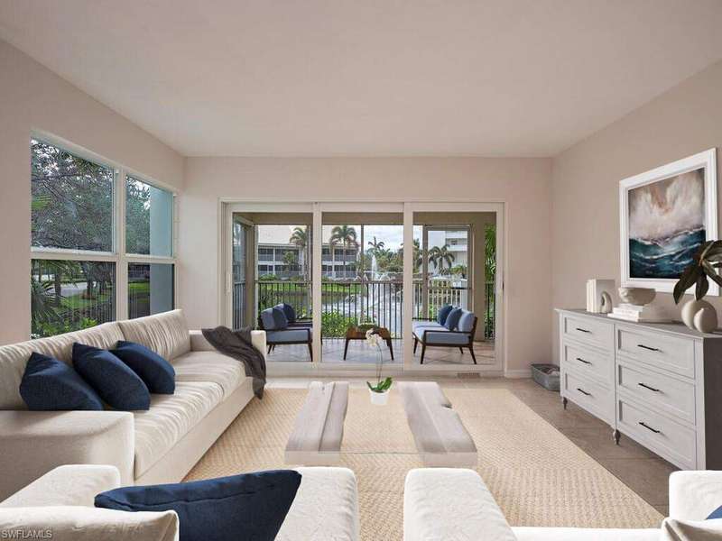 Light and bright, with all impact windows and doors (virtually staged)