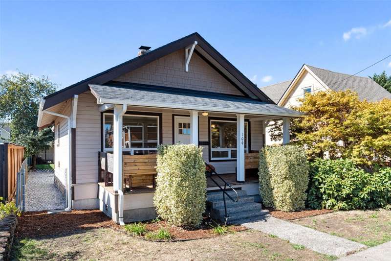 Classic Centralia home with fenced yard and inviting style.
