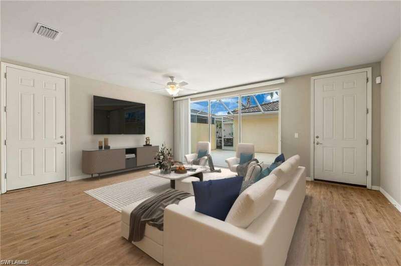 15021 Auk Way Bonita Springs FL 34135 - Primary entry (on left) into the living area