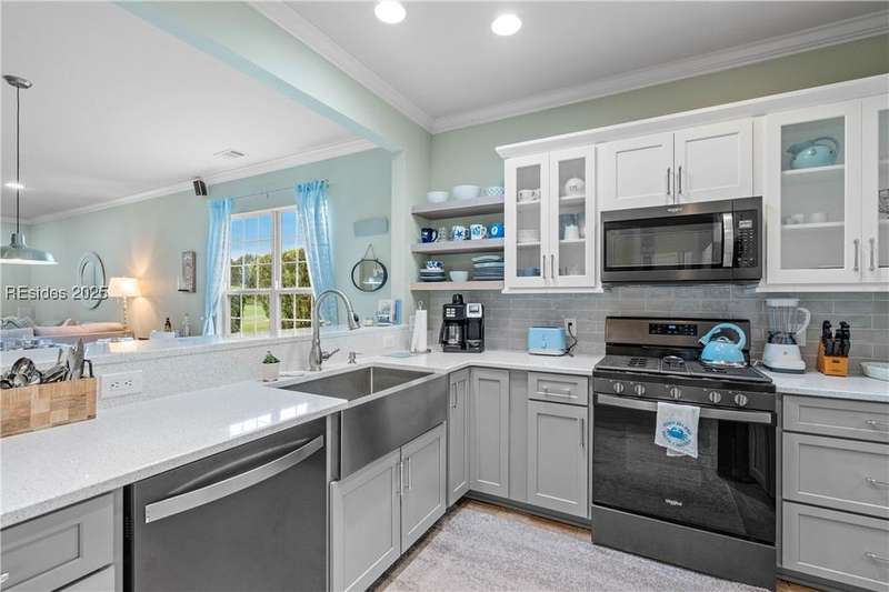 Gourmet kitchen with new appliances combines funct