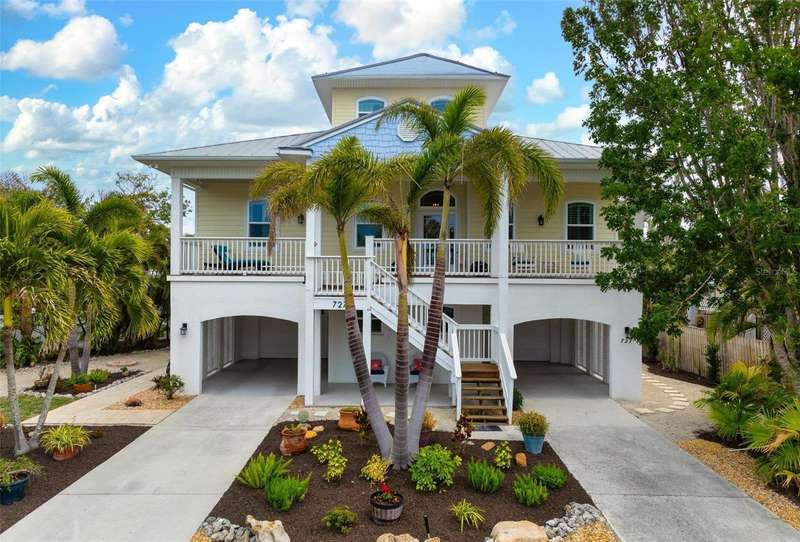 Luxurious Landscaping surrounds the property