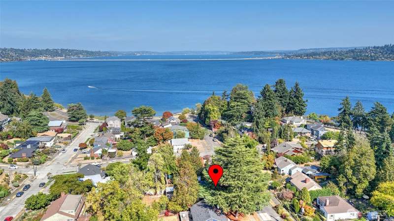 Prime location in desirable Lakewood community! Just ONE block from Lake Washington!