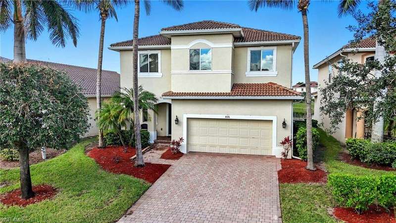 Mediterranean / spanish-style house featuring decorative driveway, stucco siding, a garage, and a tiled roof