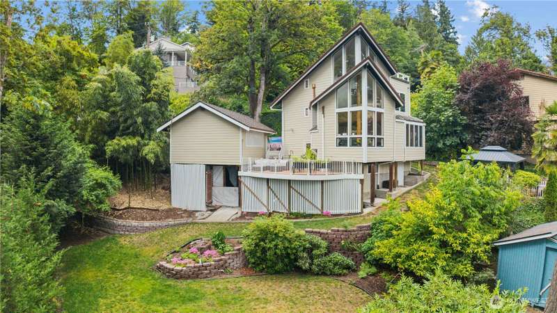 Beautiful Setting with Lake & Mt. Rainier views. Engineered driveway fully permitted and approved by the City of Mercer Island