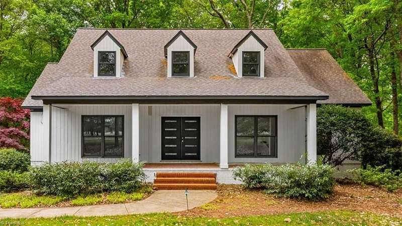 Redesigned and renovated three-level transitional Cape Cod in Carlson Farms