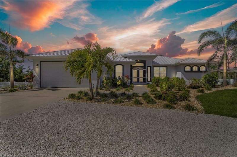 Front view of home and garage.