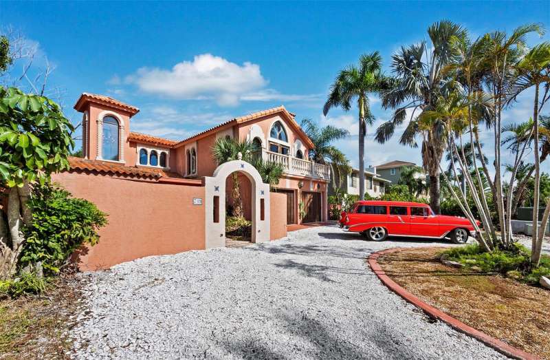 Welcome to 749 Penfield. A unique Mediterranean style waterfront home in fabulous Longboat Key.