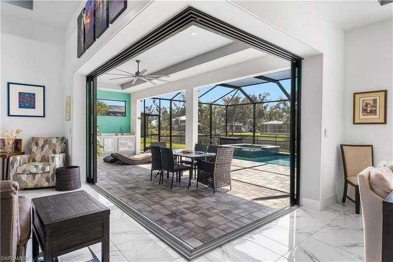 You will love the 90-degree slider leading to expansive lanai, pool and spa!